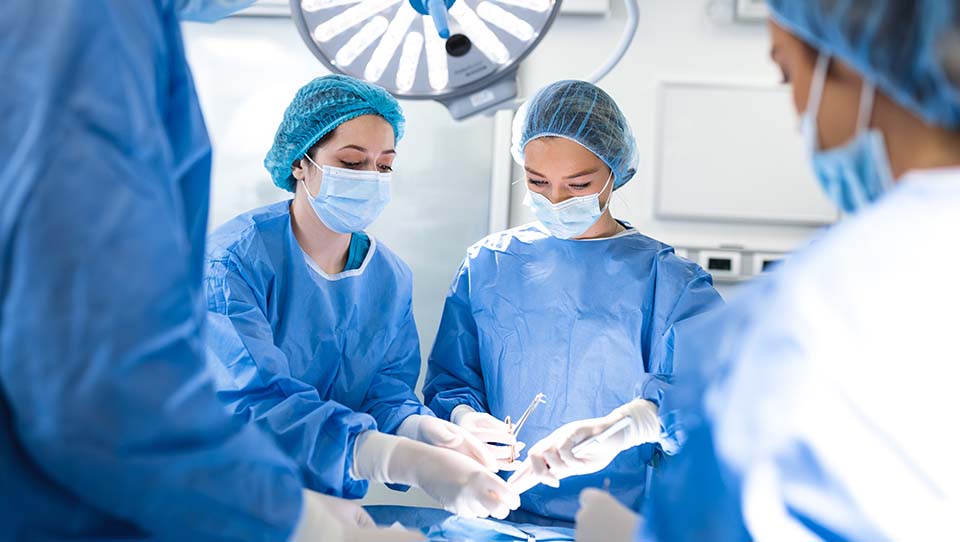 Surgeons in an operating theatre
